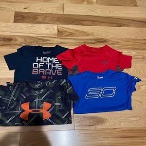 4x UA shirts size 7/small.  All like new